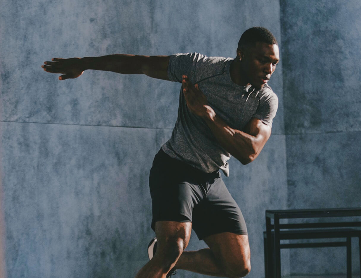 Athlete mid-stride during a sprint workout