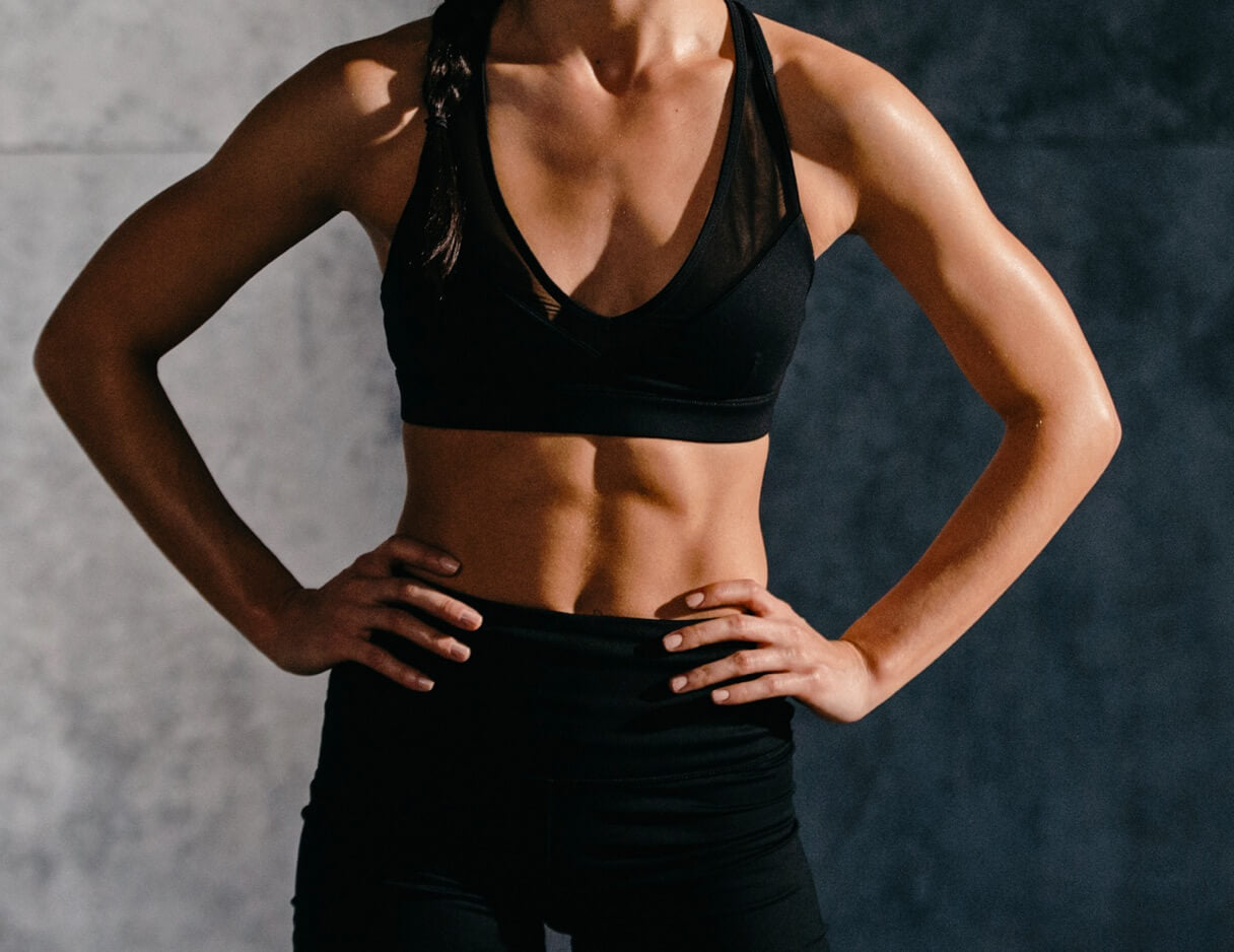 Close-up of a lean, defined midsection